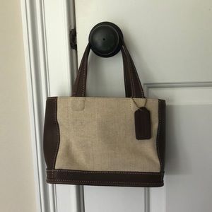 Barely used brown leather and linen Coach tote